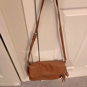 Cognac colored faux leather cross body.